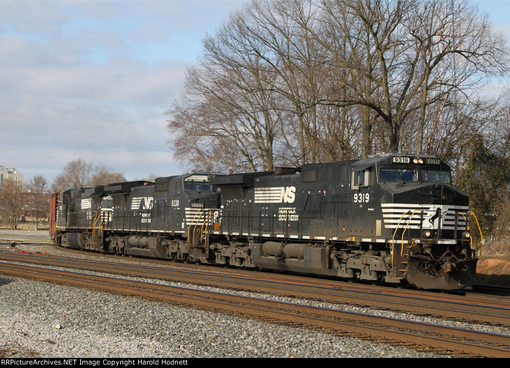 NS 9319 leads two other GE's and train 134 off the "S" line